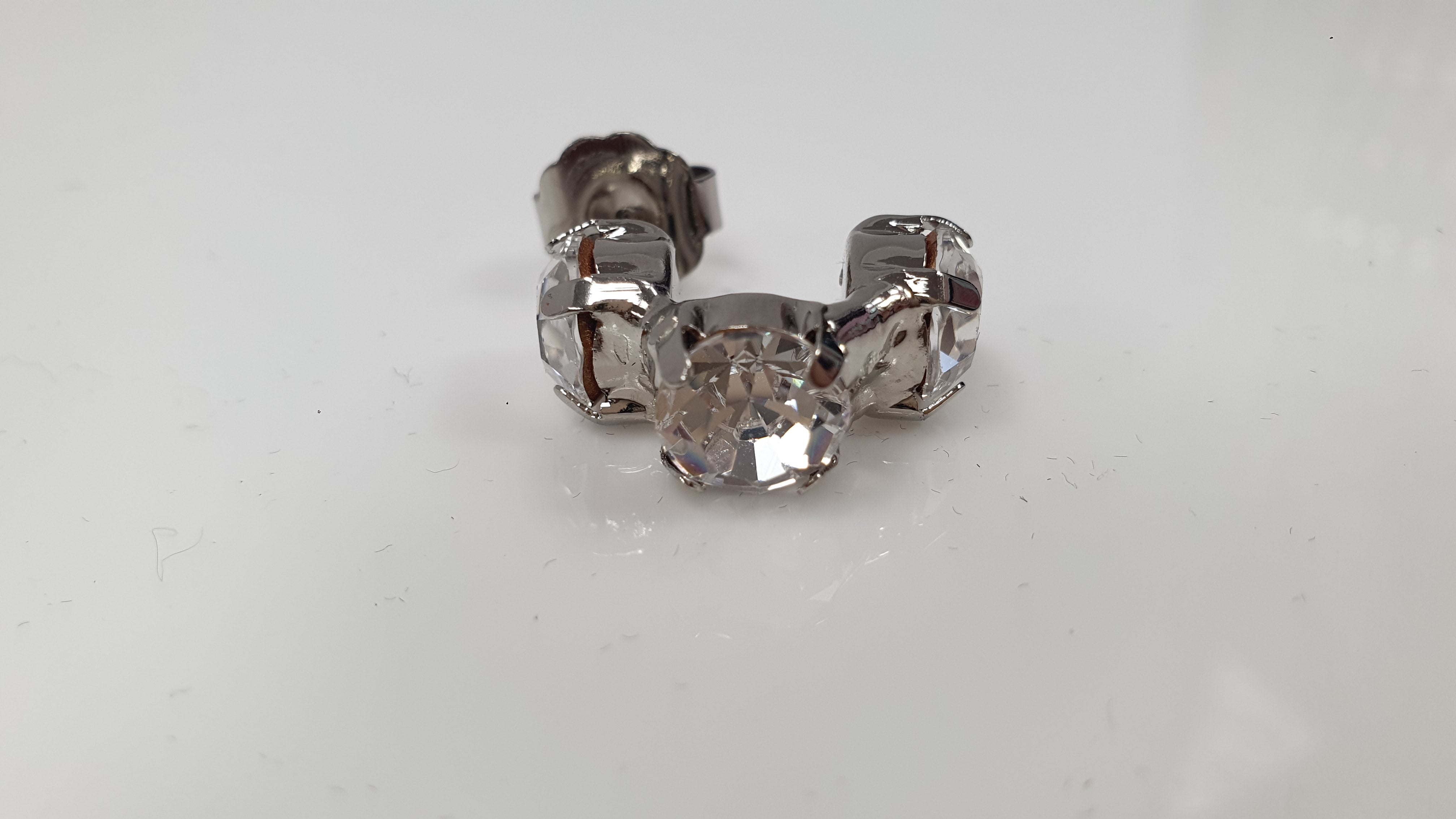 Orecchini trik bijoux mezzo cerchio con brillantini vari colori
