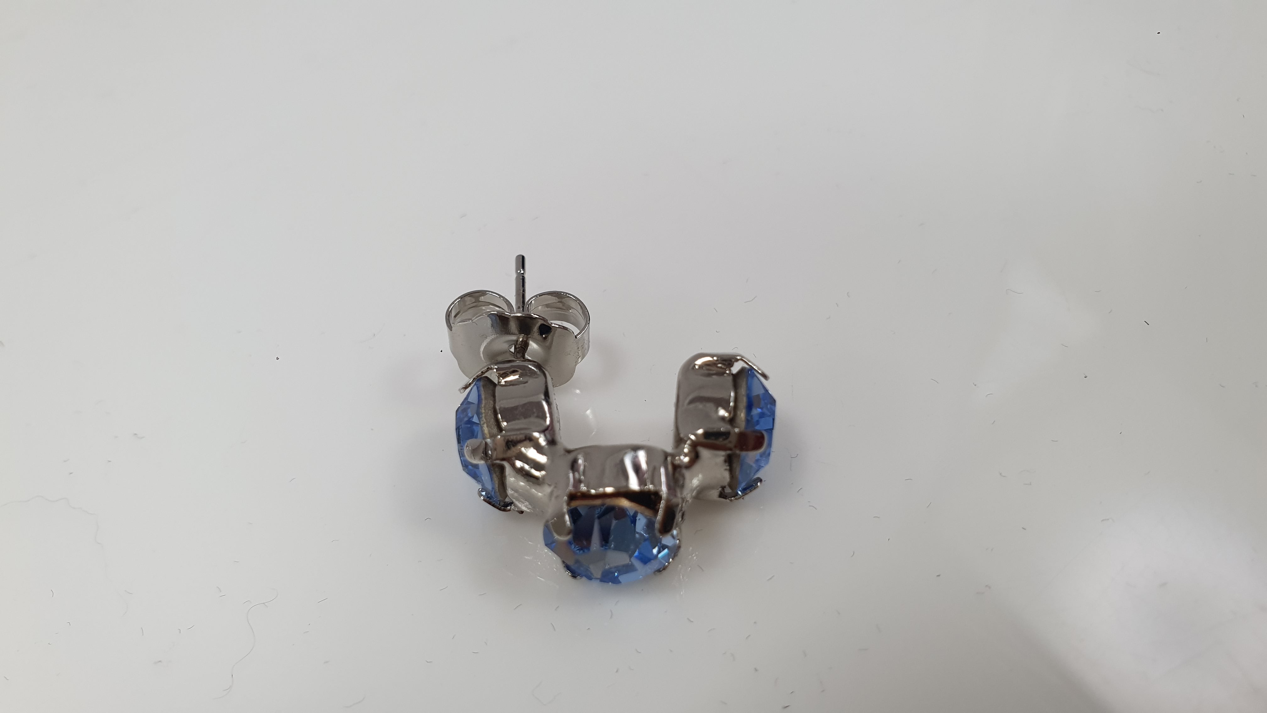 Orecchini trik bijoux mezzo cerchio con brillantini vari colori