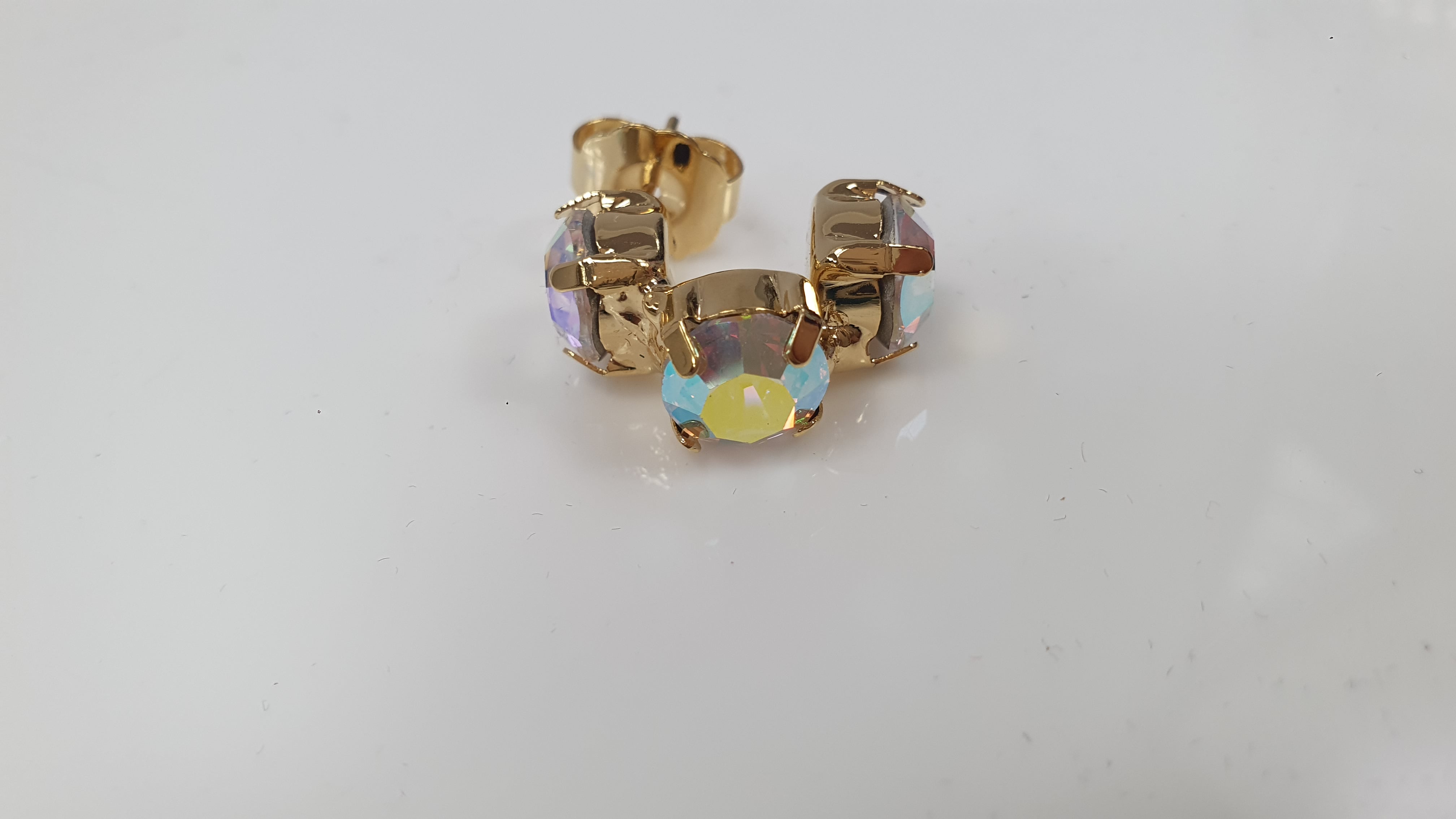 Orecchini trik bijoux mezzo cerchio con brillantini vari colori
