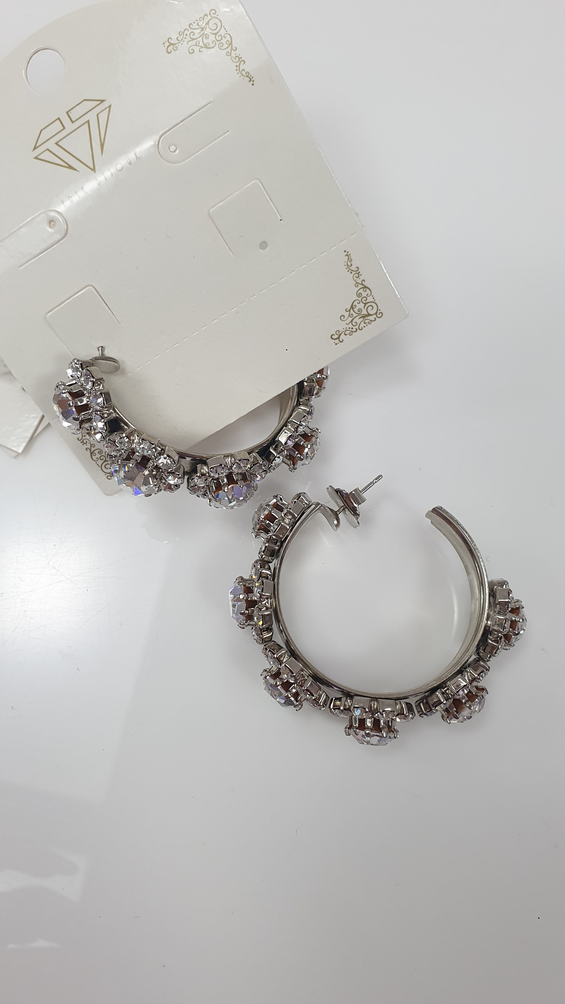 Orecchini mezzo cerchio con fiori di brillantini di trik bijoux argento