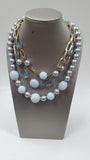 Coordinato collana e orecchini di byba bijoux azzurra