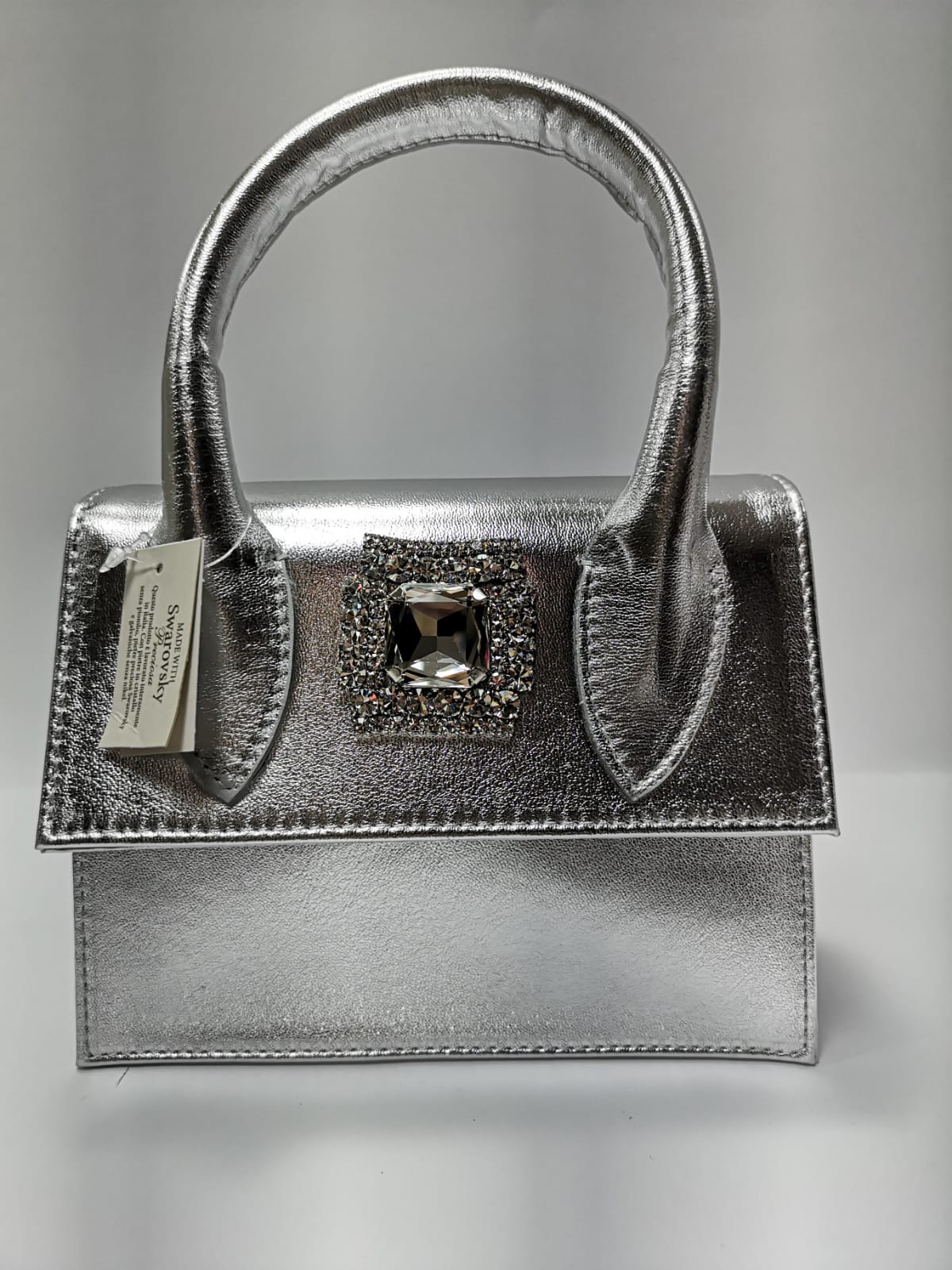 Set composto da orecchini, borsa, cintura di trik bijoux con Bottone argento