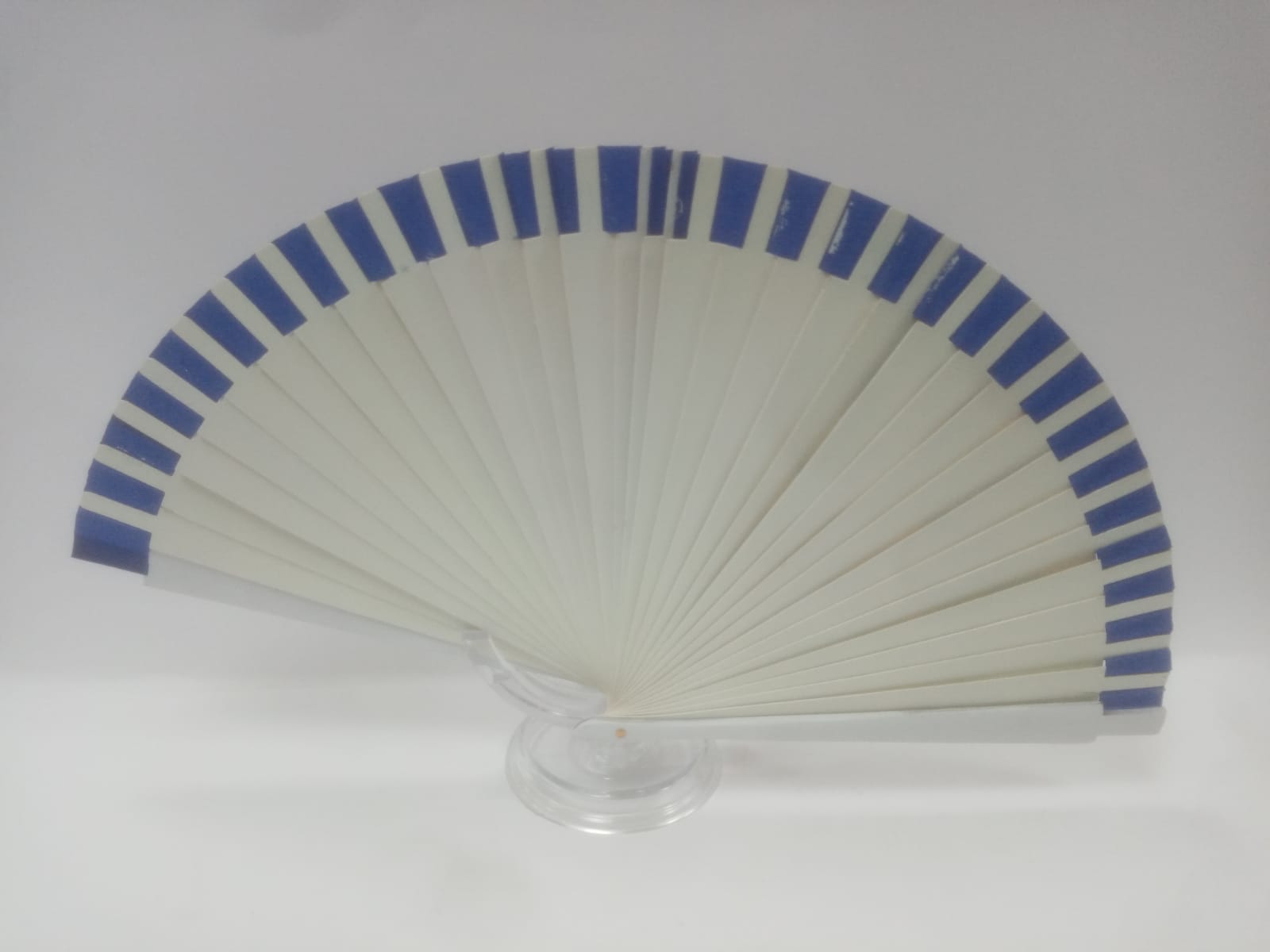 Ventaglio made in Italy con paesaggio azzurro/blu/ arancio