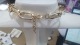 Set coordinato orecchini in resina di byba bijoux / collana in resina e metallo oro