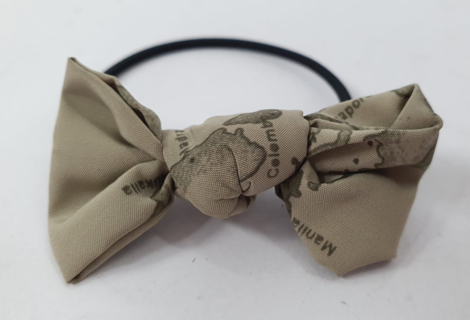 Elastici per capelli di Alviero martini con fiocco piccolo morbido Beige/panna/verde/grigio