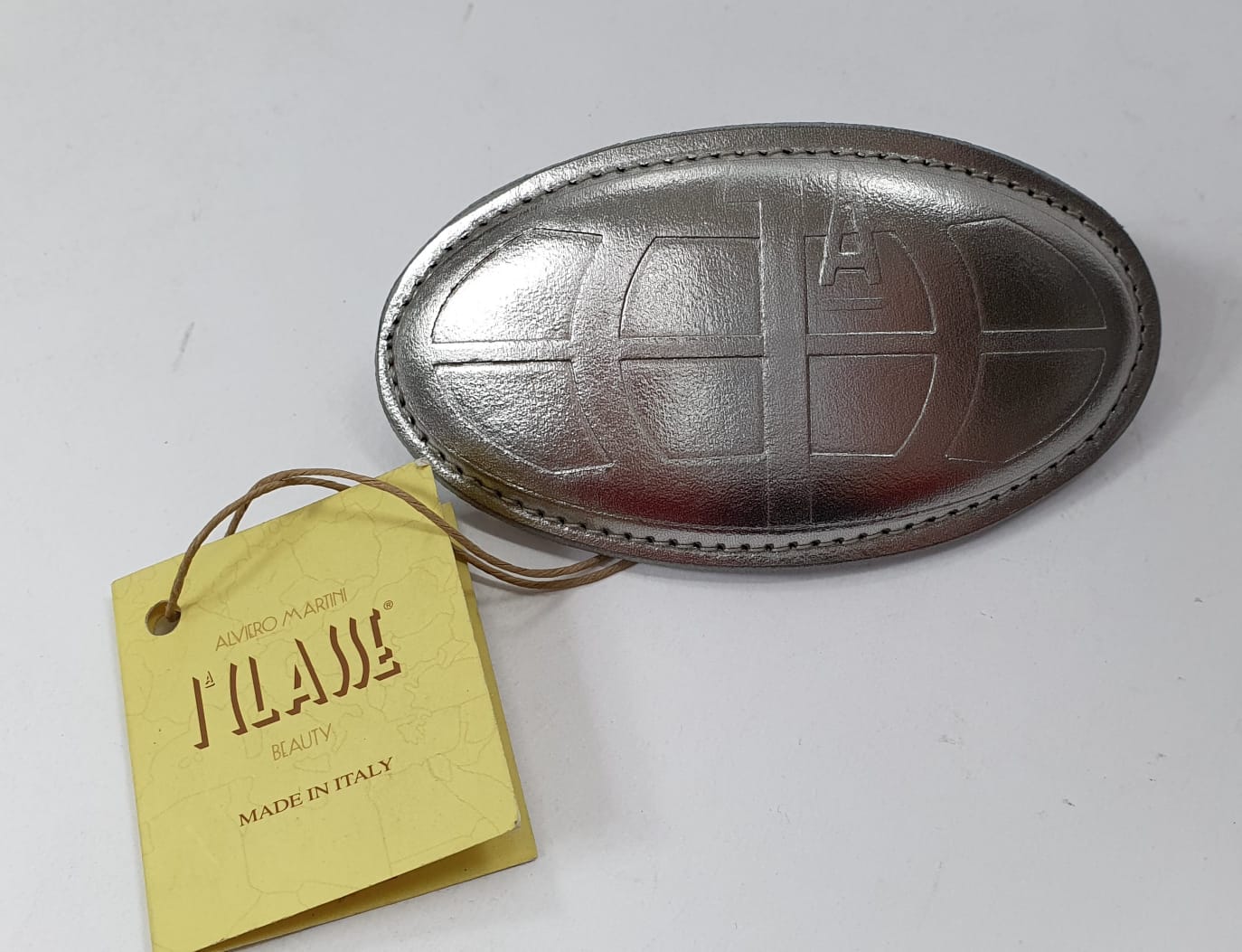 Fermagli magnetic di alviero martini con placca rigida  lucida oro/nero/argento