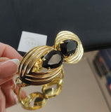 Bracciale donna di byba bijoux rigido montatura oro e cristallo nero/ verde