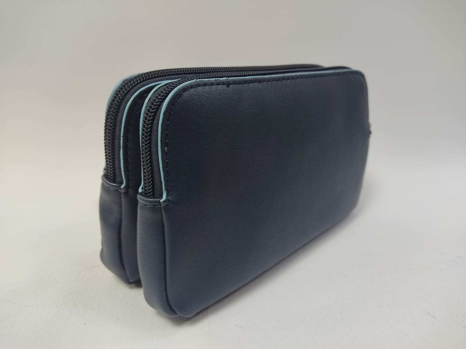 Pochette uomo della linea di rodrigo 468 con manicotto Nero/ blu / marrone