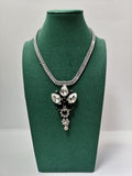 Set da donna di collana e orecchini con fiore pendente argento di trik bijoux