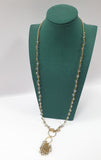 Collana lunga con pendente gemir con pietre grigie