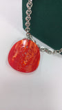 Collana lunga di primadonna con ciondolo rosso
