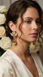 Orecchini di TRIK BIJOUX montatura oro con piccole perle