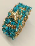 Bracciale rigido turchese con stella in oro centrale