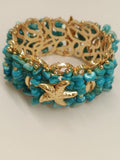 Bracciale rigido turchese con stella in oro centrale